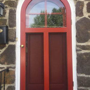 Round Top Wood Storm Door - A Pop Of Red For Your Home